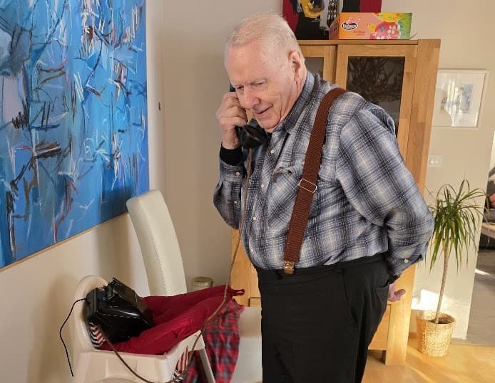 The final result: My grandfather listening to the completed time capsule.